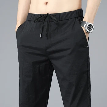2023 Yaz Yeni erkek Buz İpek İnce rahat pantolon Kore Moda Streç Çabuk Kuruyan Pantolon Slim Fit Pantolon Erkek Marka Giyim